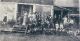 Group in front of Clarke store run by Leonard Bates.  Occassion / date unknown